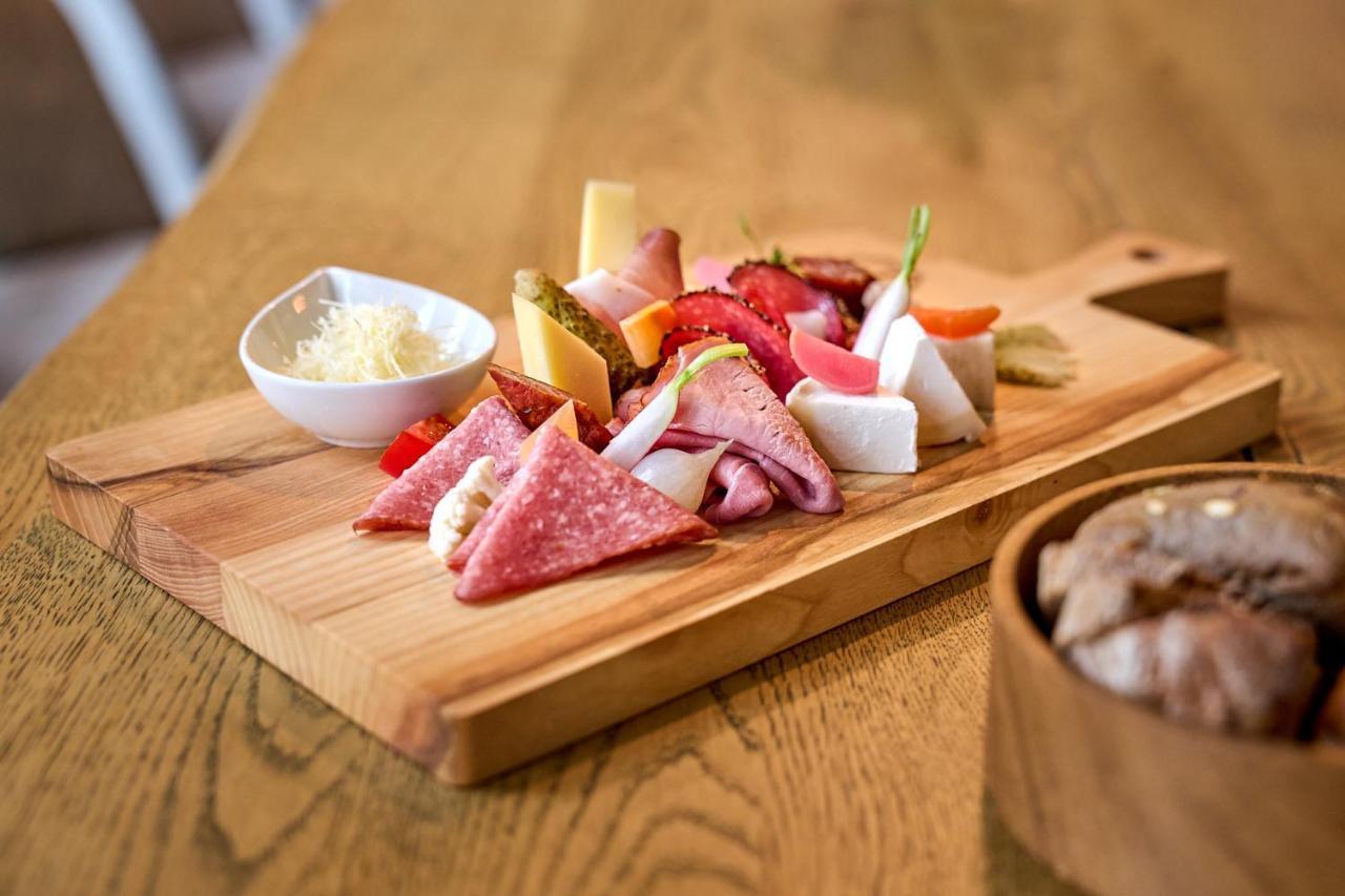 A-Rosa Ifen Hotel Kleinwalsertal Hirschegg  Εξωτερικό φωτογραφία A selection of cured meats and cheese